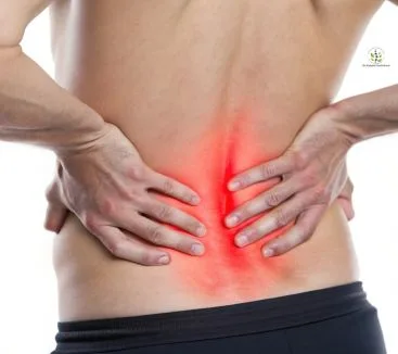 Man suffering from lower back pain highlighted in red, symbolizing spine pain before physiotherapy treatment at Advance Physiotherapy Clinic, Chhatrapati Sambhajinagar (Aurangabad).